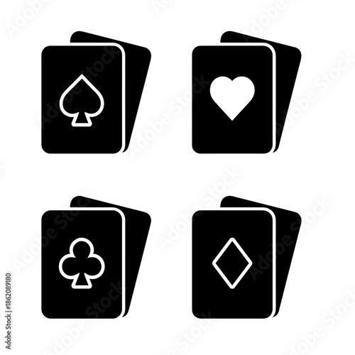 Classic playing card suit symbols on minimalist gray background