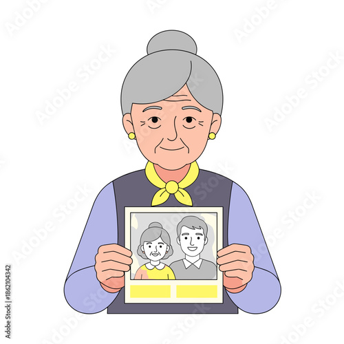Elderly woman smiling while holding a photo of two young people  