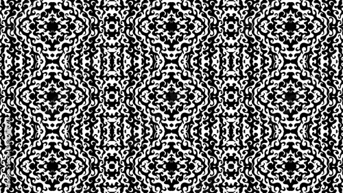 Intricate black and white ornamental pattern with symmetrical designs