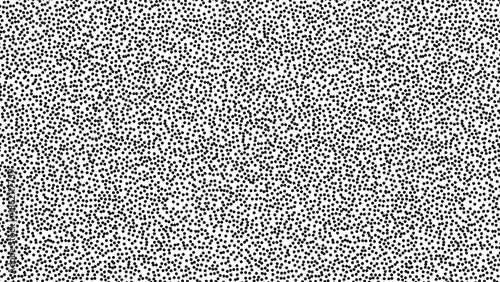 Pointillist pattern with small black dots on white background