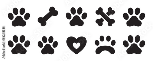 Assorted collection of black pet paw prints dog bones and heart shapes for vet clinic