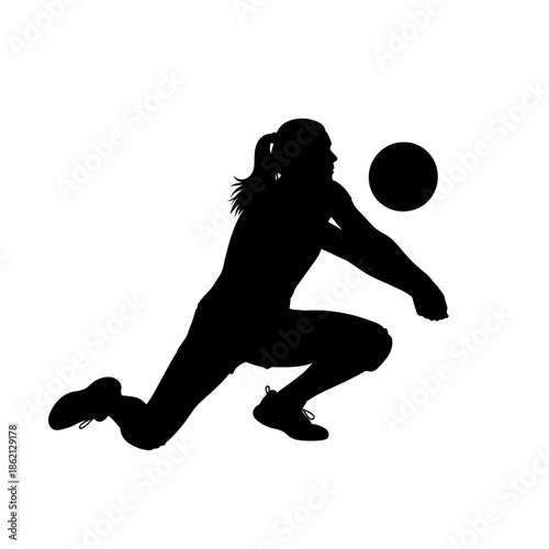 Silhouette of a female volleyball player bumping the ball.