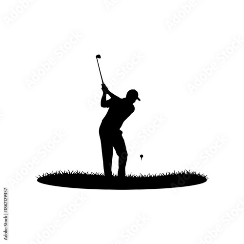 Silhouette of a golfer hitting a golf ball on grass.