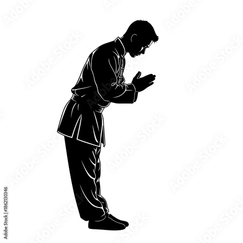 Silhouette of a man in martial arts stance bowing respectfully.