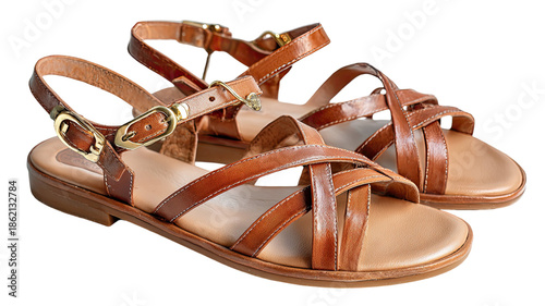 Brown leather flat sandals with ankle straps comfortable casual summer footwear detailed studio photography isolated on white background