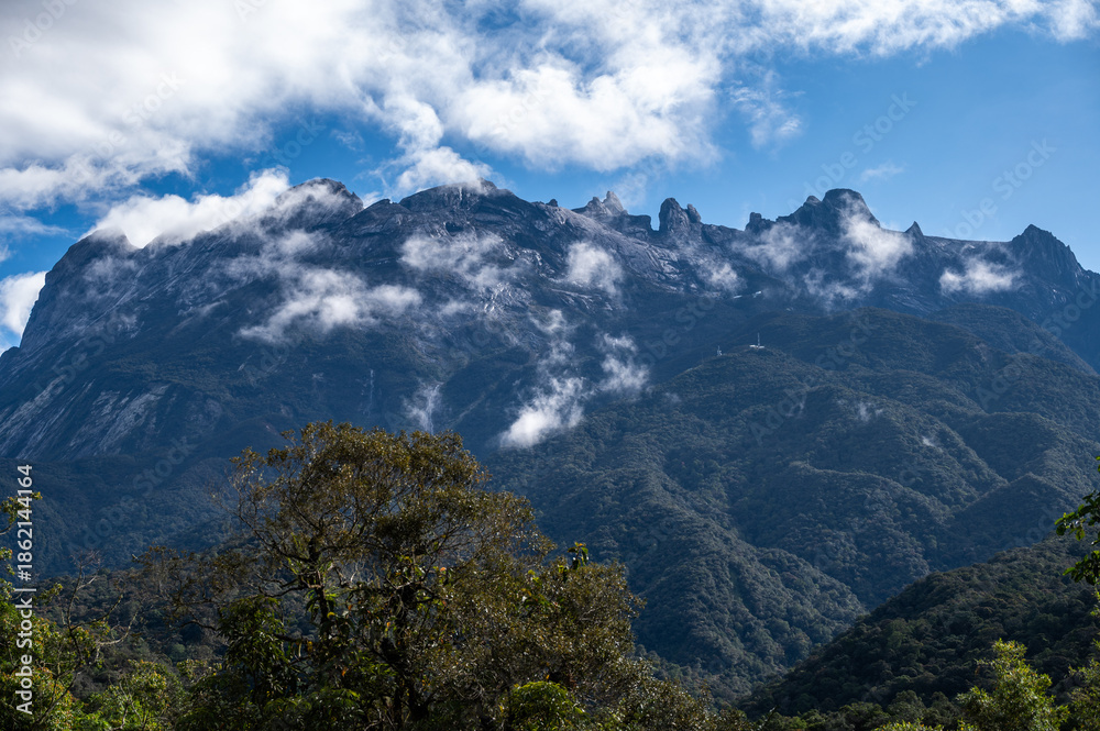 Fototapeta premium Mt.Kinabalu the highest mountains in Malaysia seen from Kinabalu Park located on the west coast of Sabah, Malaysian Borneo.