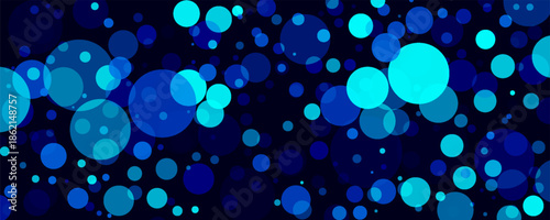 Shiny blue bokeh background with circles and flashes