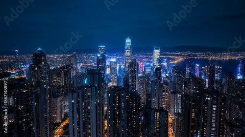 Wallpaper Mural Panoramic time lapse of the hong kong skyline at night. A futuristic metropolis with illuminated skyscrapers and a dramatic blue sky showing the transition from dusk to evening Torontodigital.ca
