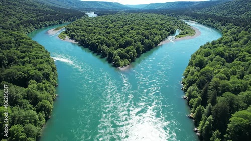 Breathtaking high aerial drone shot showing two distinct, vibrant turquoise rivers flowing and smoothly converging to form one large, powerful stream smoothly, wilderness, landscape