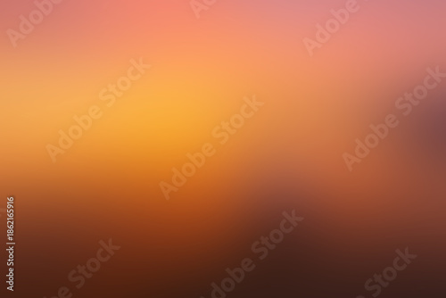 Εκτύπωση καμβά Vibrant and tranquil blurred gradient background in warm orange, yellow, and bro