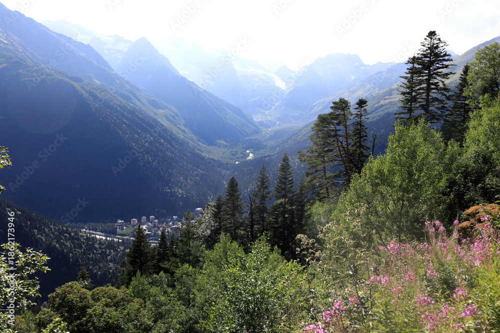 Fototapeta premium Mountain valley view with river and village