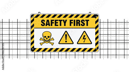 Safety first warning sign on metal fence background