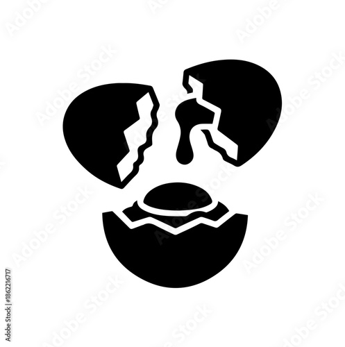 Broken egg shells and yolk silhouette icon, black vector illustration for cooking, baking, or fresh farm breakfast concepts.