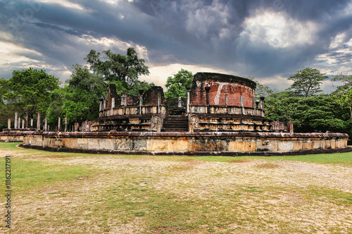 Monsoon View of the Symbol of Polonnurawa - the Magnificent Vatadage, Circular stupa, previous home to the Buddha's tooth,built by Parakrambahu,12th cent CE at Polonnaruwa, Sri Lanka