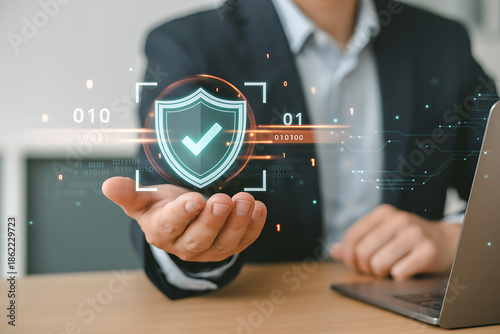 Man holding digital security shield