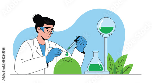 Female scientist in a lab coat and safety goggles using a pipette to drop green liquid onto a plant specimen in a laboratory.