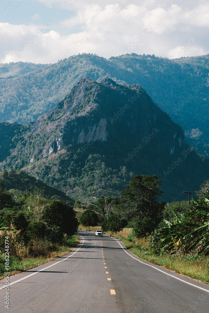 Fototapeta premium Open Road Journey Through Mountain Landscape