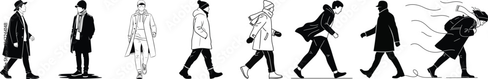 Fototapeta premium Silhouettes of people walking in a line