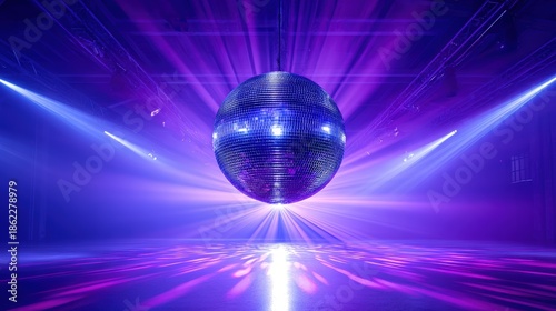 Shimmering disco ball reflecting vibrant purple and blue lights in an empty dance floor, creating a lively atmosphere for a party or celebration event
