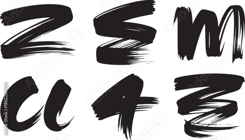 Different black ink brush strokes on a clean white background displaying diverse shapes and textures