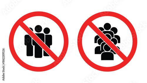Two prohibition signs depicting a group of people are clearly visible indicating a restriction on gatherings or assemblies