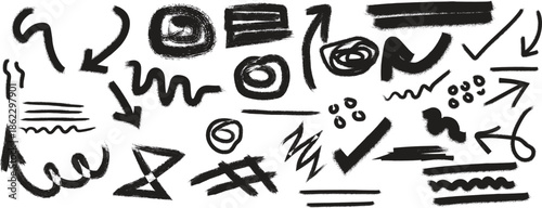A collection of hand drawn black arrows and abstract shapes on a white background