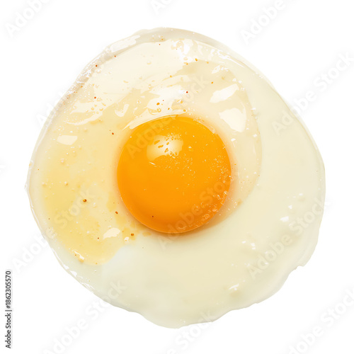 Fried Egg Placed on a Plain Surface With Yellow Yolk and White Egg White