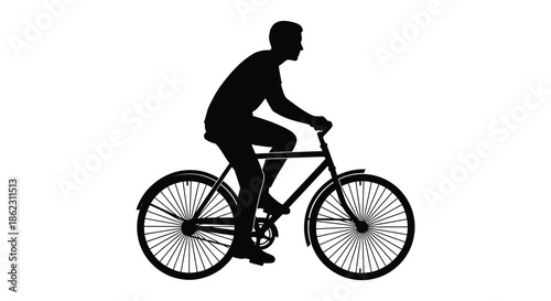 A striking silhouette of a cyclist riding a classic bicycle showcasing movement and simplicity