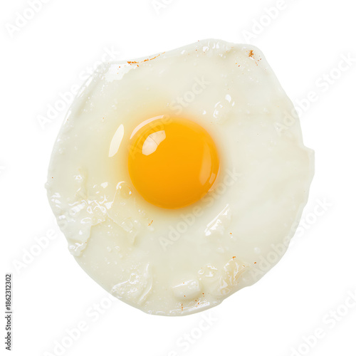 Fried Egg Placed on a Plain Surface With Yellow Yolk and White Egg White
