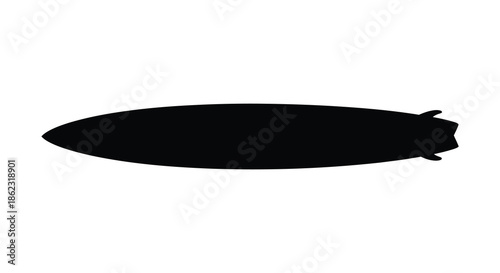 A striking silhouette of a classic airship showcasing its long slender form and tail fin