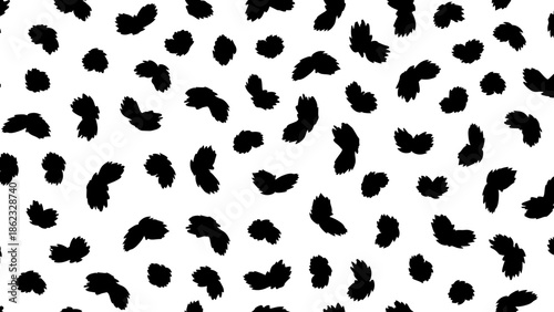 Black, irregular spots are scattered across a white background, creating a simple, abstract pattern.