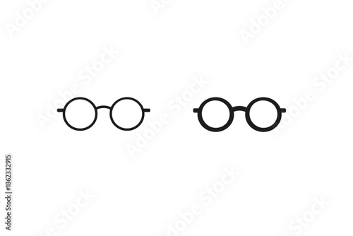 Two pairs of round eyeglasses, one thin rimmed and one thick rimmed, on white