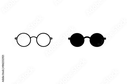 Two round eyeglasses, one outlined and one solid black, on a white background