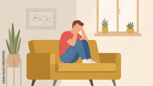 Man feeling depressed and stressed, sitting alone on a couch at home