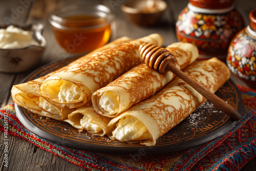 Thin crepes filled with sweet cottage cheese, traditionally prepared for Shrovetide. Soft texture, delicate layers, and a simple homemade presentation rooted in seasonal tradition.