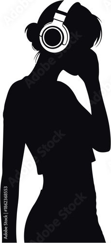 Silhouette of a woman wearing headphones and talking on the phone
