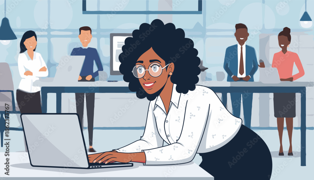 Fototapeta premium Smiling Black professional woman with glasses working on a laptop at her desk in a modern open-plan office with a diverse team of colleagues in the background
