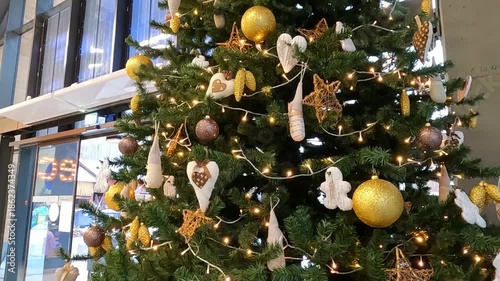 NOWY TARG, POLAND - DECEMBER 30, 2025: A huge Christmas tree inside a shopping mall.