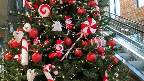 NOWY TARG, POLAND - DECEMBER 30, 2025: A huge Christmas tree inside a shopping mall.