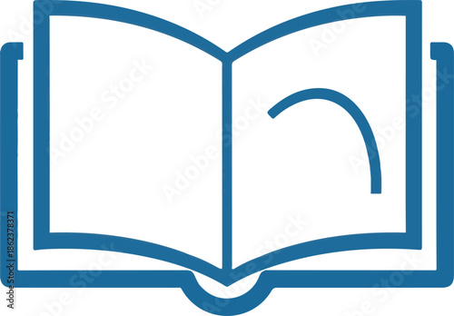 An open book lies on a table with pages turning