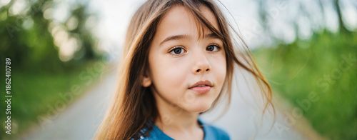 young girl with long brown ...