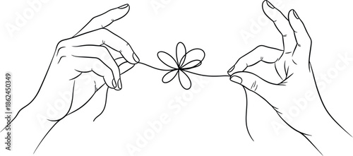 Two hands gently holding a flower
