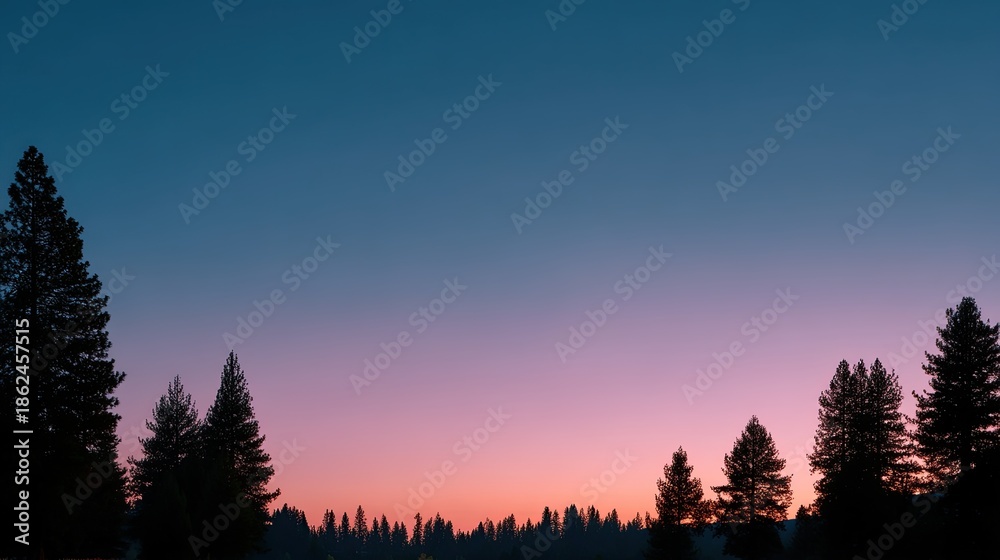 Fototapeta premium Tranquil Sunset Over Silhouetted Evergreen Trees with Vibrant Colors in the Sky and Calm Atmosphere at Dusk, Perfect for Nature Photography Projects