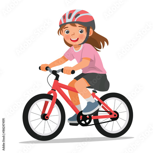 Little girl riding a bicycle wearing helmet