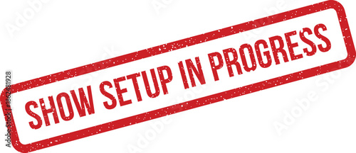 Grunge styled rubber stamp showing SHOW SETUP IN PROGRESS indicating an event preparation phase or ongoing construction