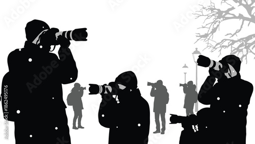 People observing through binoculars in winter