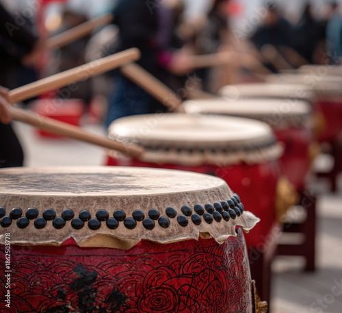 Close-up of large drums being played