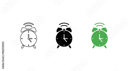 Three alarm clocks in different colors