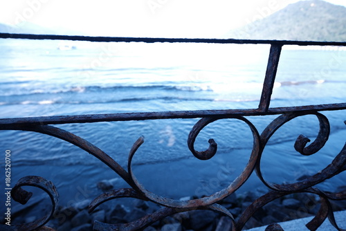 rusty metal, against the blue sea