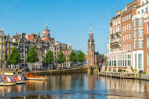 Photography The Munttoren, the Mint Tower located on  Muntplein square in Amsterdam, Netherl
